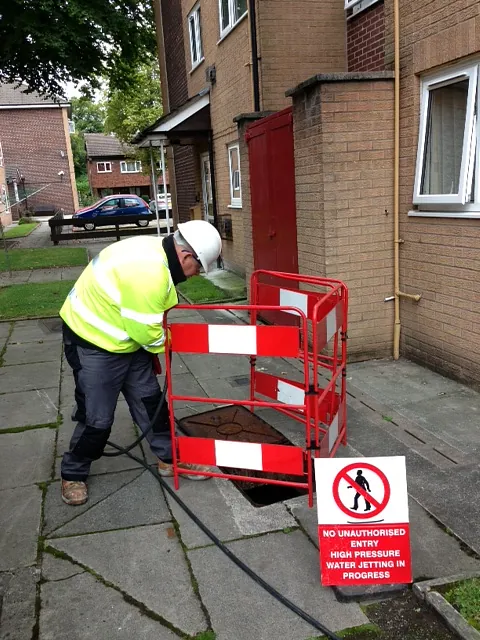 Man working, Drain Cleaning in Worsley, Manchester