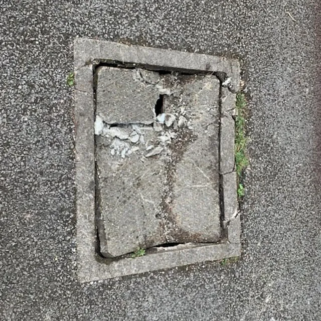 broken man hole cover